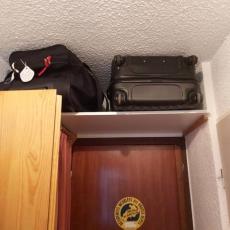 Rangement pour valise